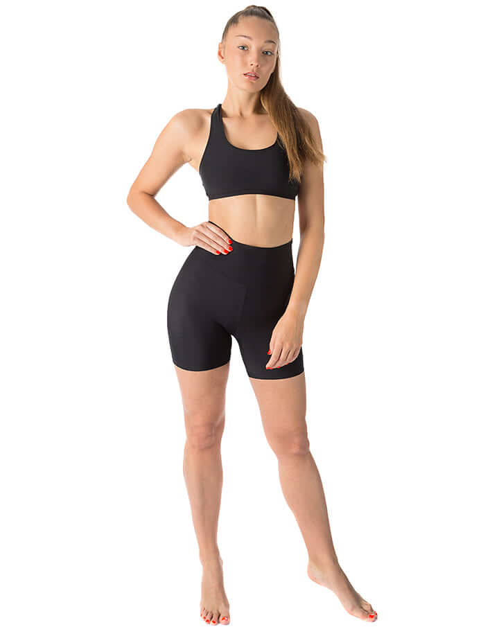 Svarta korta leggings med hög midja, tajt passform i mjukt sportmaterial.