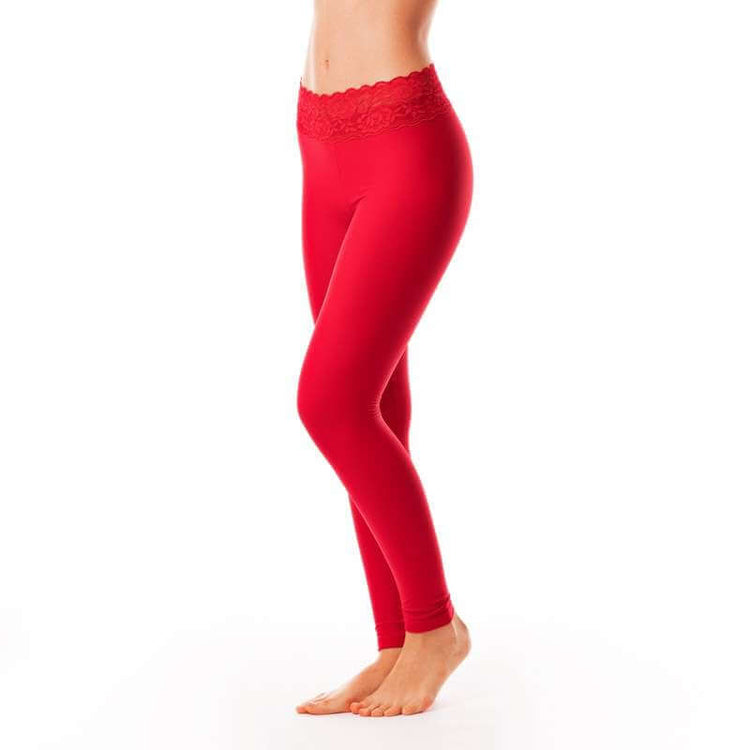 Röda leggings med spetsdetalj i midjan, kroppsnära mjukt tyg, kvinnlig stil.