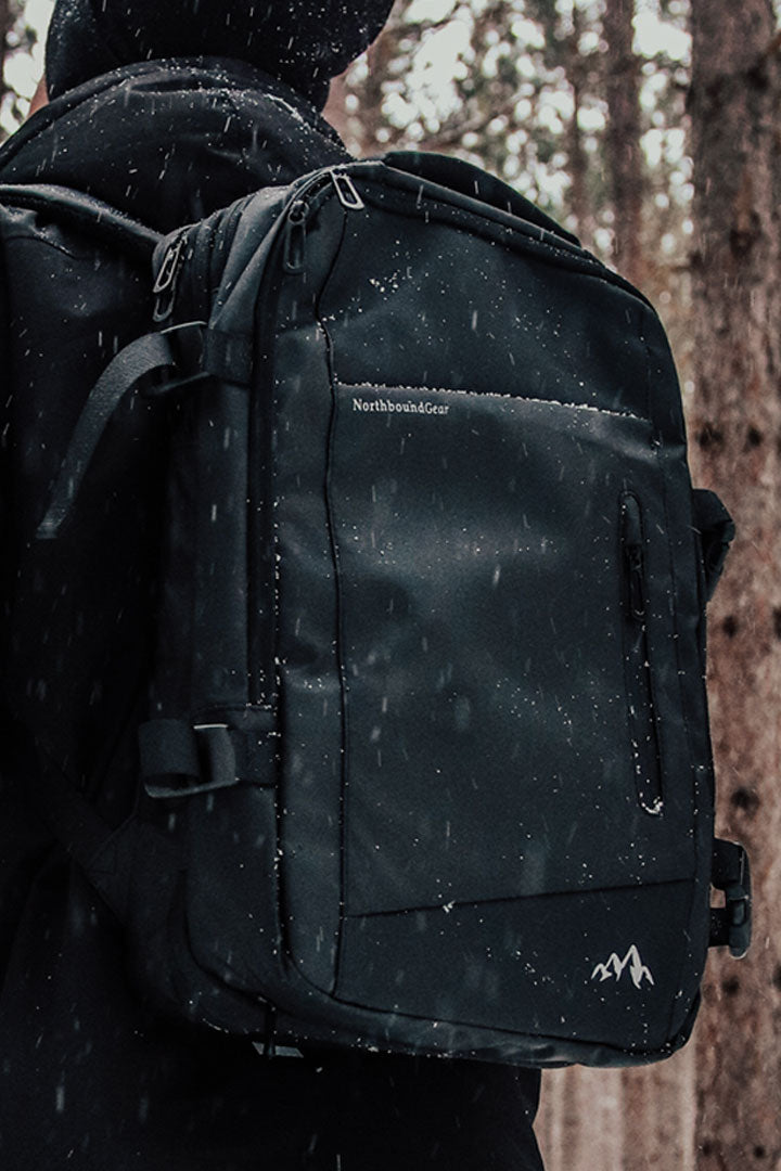 "Voyager" Expandable Backpack 26L / 38L With Built-In Rain Coat