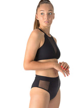 Svarta luftiga meshshorts med hög midja och genomskinliga sidor, sportig design.