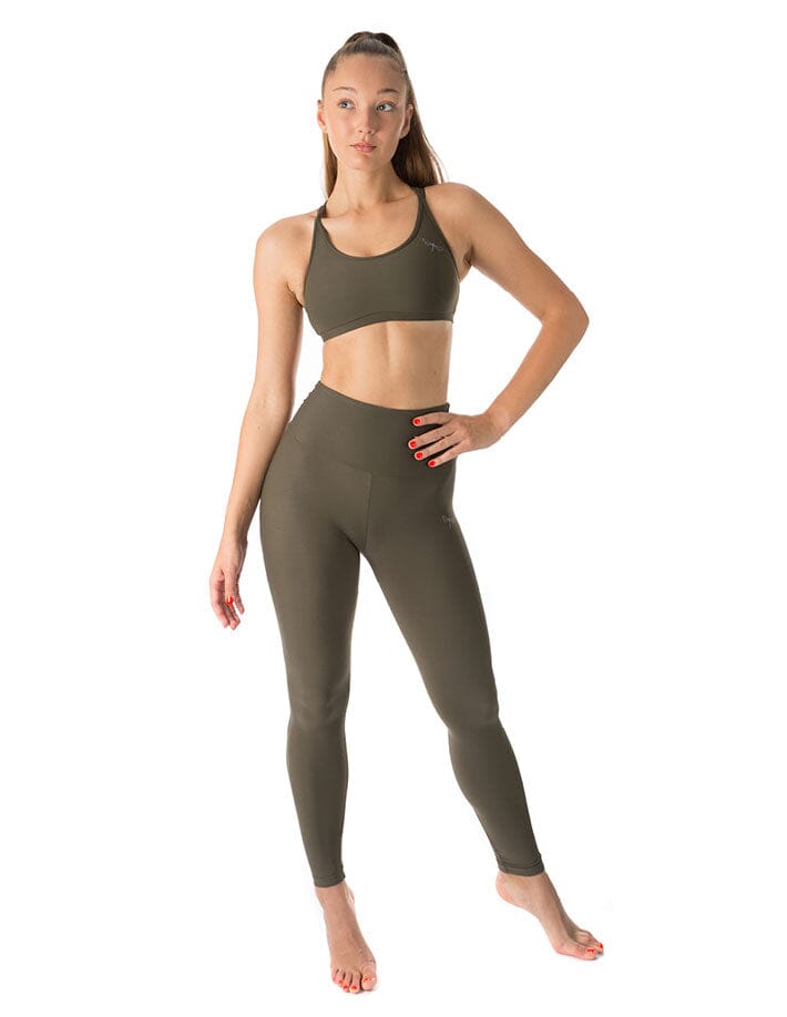 Mörkgrön högmidjad yogaleggings med bred midjeresår, figurnära passform i mjukt material.