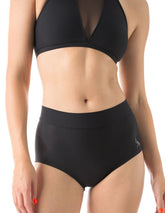 Svarta Mandy Pole-shorts i hög midja med mjukt, stretchigt material och diskret logga.