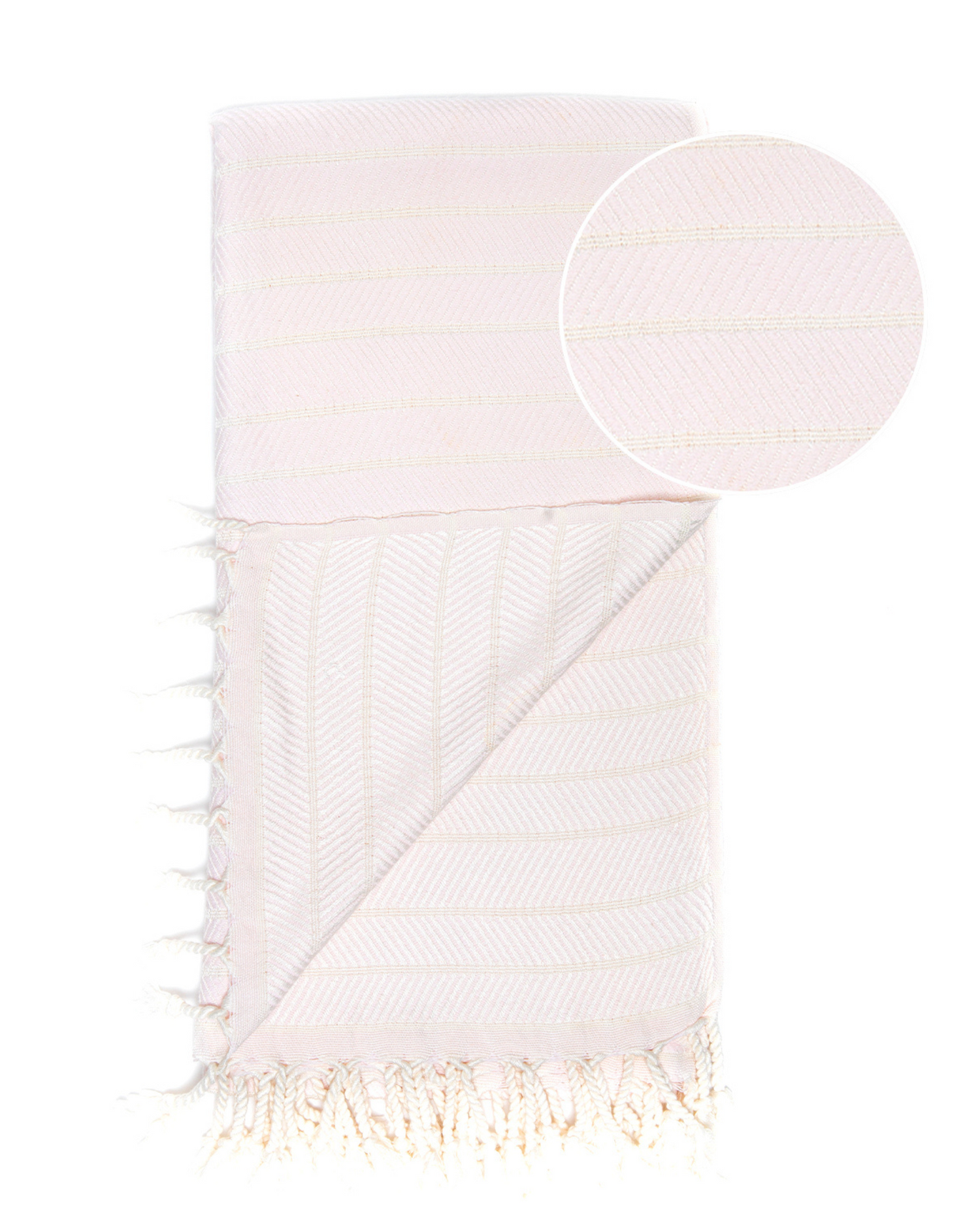 Rosa hammamhandduk i bomull och bambu med fransar och tunn struktur med linjer.
