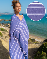 Mörkblå randig bomullshammam strandhandduk med fransar, lätt och snabbtorkande.