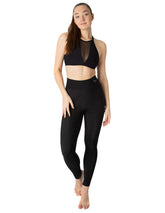 Svarta högmidjade leggings med smickrande passform och elastisk midja, värmande material.