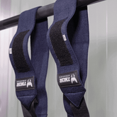 Blå handledslindor i stretchigt material med kardborreband och Viking-logotyp, 60 cm lång.