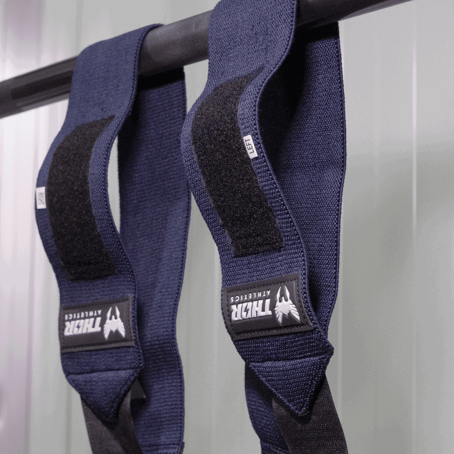 Blå handledslindor i stretchigt material med kardborreband och Viking-logotyp, 60 cm lång.