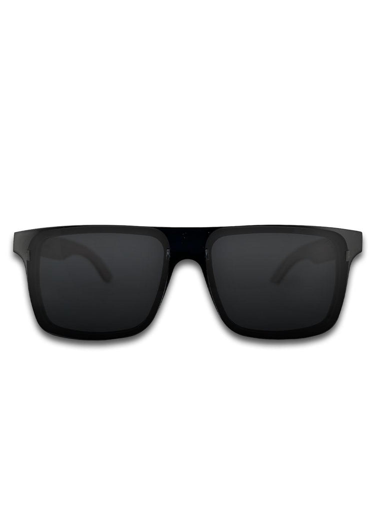 Svarta fyrkantiga solglasögon med bred acetatbåge och mörka glasögonlinser.