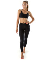 Svarta mellanhöga leggings i stretchigt material med smickrande och bekväm passform.