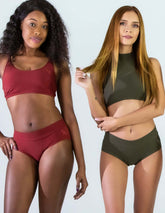 Röd aktiv sport-bh och underdel med breda band och mjukt material, grön aktiv sport-bh och underdel i matchande set, båda i.