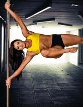 Gul sport-BH med ergonomisk passform och breda axelband, fukttransporterande material.